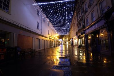 Illuminated buildings in city at night
