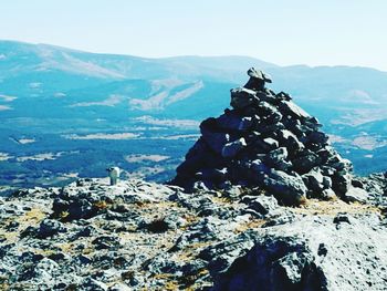 Scenic view of rocky mountains against clear sky