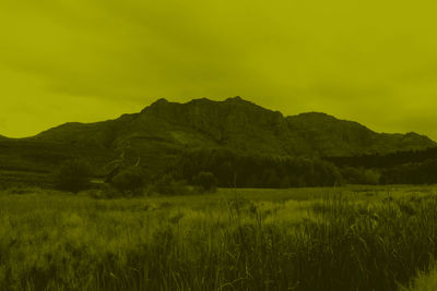 Scenic view of landscape against sky during sunset