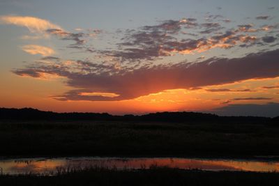 Scenic view of silhouette landscape against sky during sunset