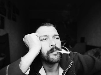 Close-up of man smoking cigarette