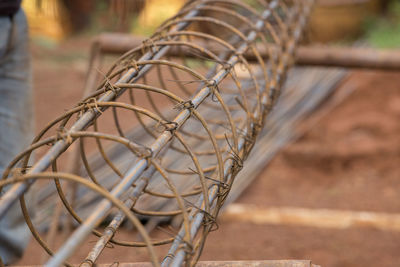 Close-up of rusty metal on field