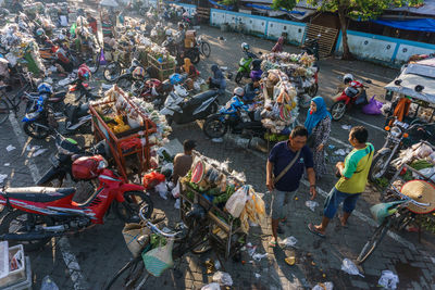 High angle view of people shopping at vegetable market