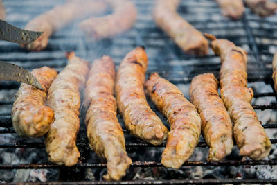 Close-up of meat on barbecue grill