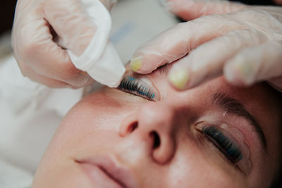 Close-up of woman holding hands