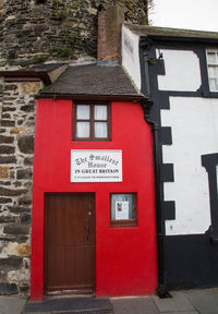 Red closed door of building