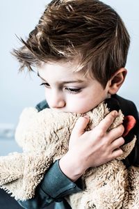 Close-up portrait of boy looking away