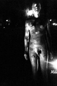 Close-up of lamp over black background