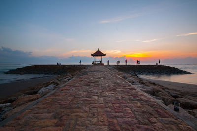 View of beach at sunset