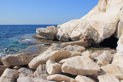 Scenic view of sea against blue sky