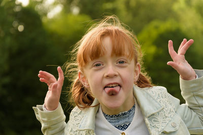 Close-up portrait of happy girl