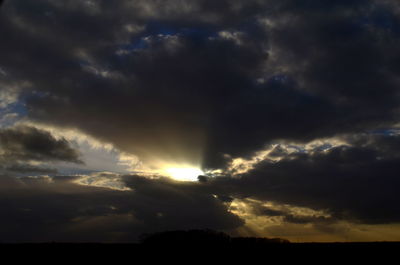 Low angle view of dramatic sky during sunset