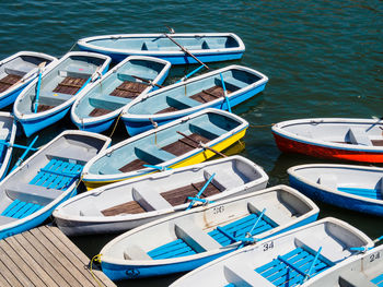 High angle view of boats moored at pier