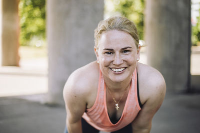 Portrait of smiling mature blond woman