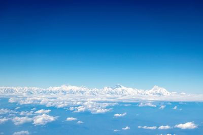Low angle view of clouds against blue sky