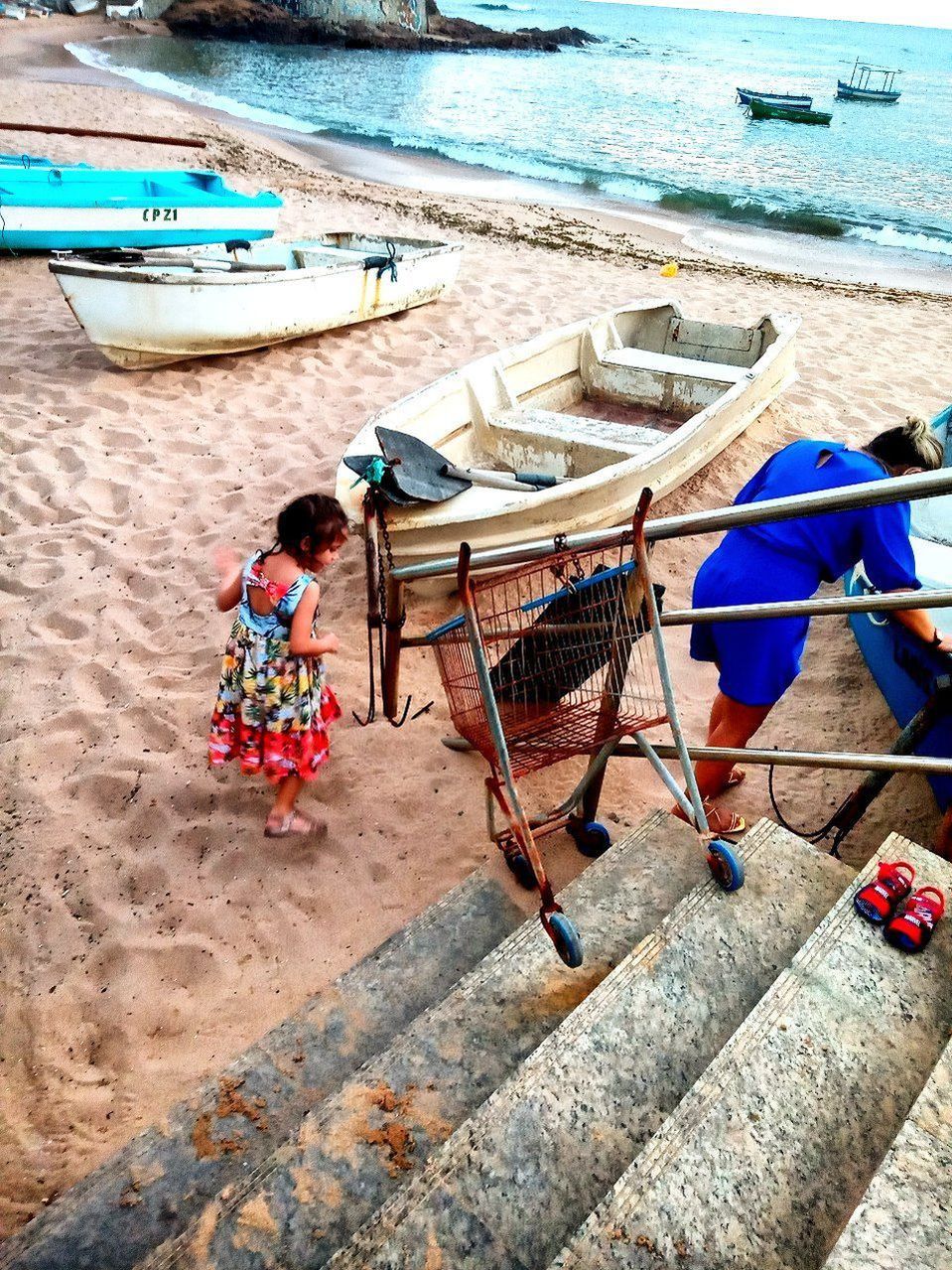 water, beach, sea, land, nautical vessel, sand, transportation, high angle view, nature, day, mode of transportation, vehicle, moored, vacation, outdoors, sunlight, boat, women, men, relaxation, full length, coast, adult, sitting, travel, person, leisure activity, lifestyles, chair, beauty in nature, shore, seat