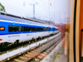 Close-up of wet train window