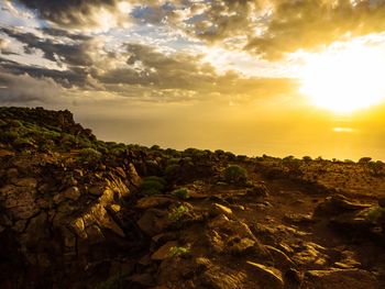 Scenic view of landscape against sky during sunset