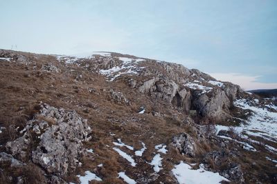 Scenic view of snowcapped mountain against sky