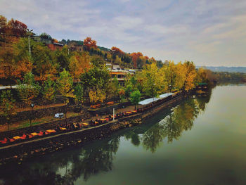 Reflection of trees in lake against sky during autumn