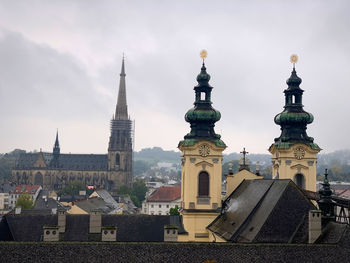 View of buildings against sky in city