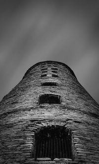 Low angle view of old building against sky