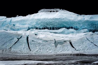 Scenic view of snow covered mountains