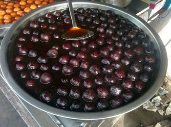 High angle view of berries in bowl on table