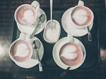 Coffee cups on table