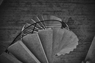 High angle view of spiral staircase on table