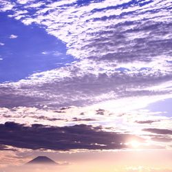 Scenic view of sea against sky at sunset