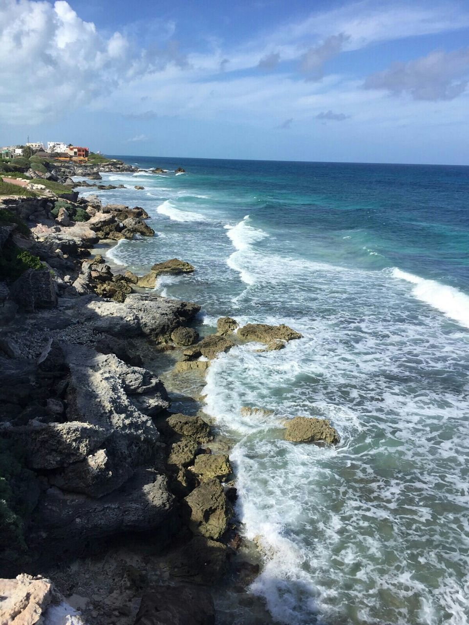 sea, water, horizon over water, sky, scenics, wave, beauty in nature, tranquil scene, rock - object, surf, tranquility, nature, beach, rock formation, shore, motion, cloud - sky, idyllic, seascape, cloud