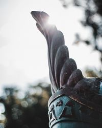 Close-up of statue against sky