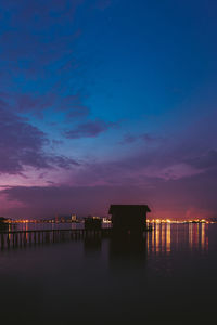 Scenic view of sea against sky at sunset