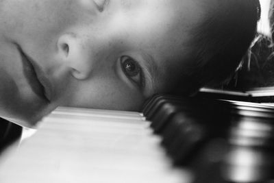 Close-up of baby girl playing with book