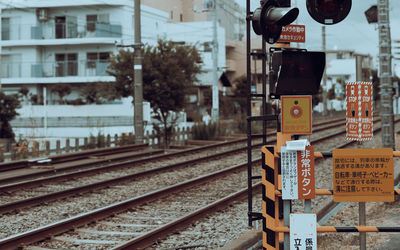 High angle view of railroad tracks by buildings