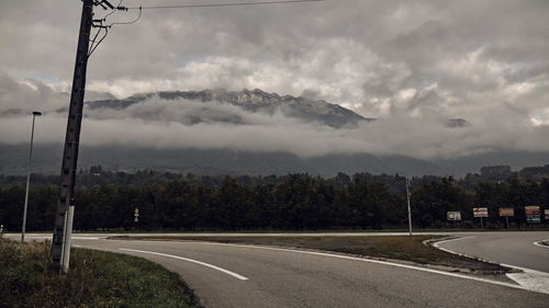 Road in city against sky