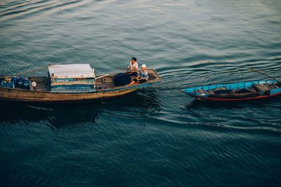 High angle view of people sailing on sea