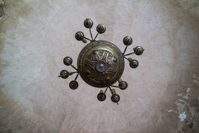 Directly below shot of clock on ceiling