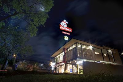 Low angle view of illuminated building at night