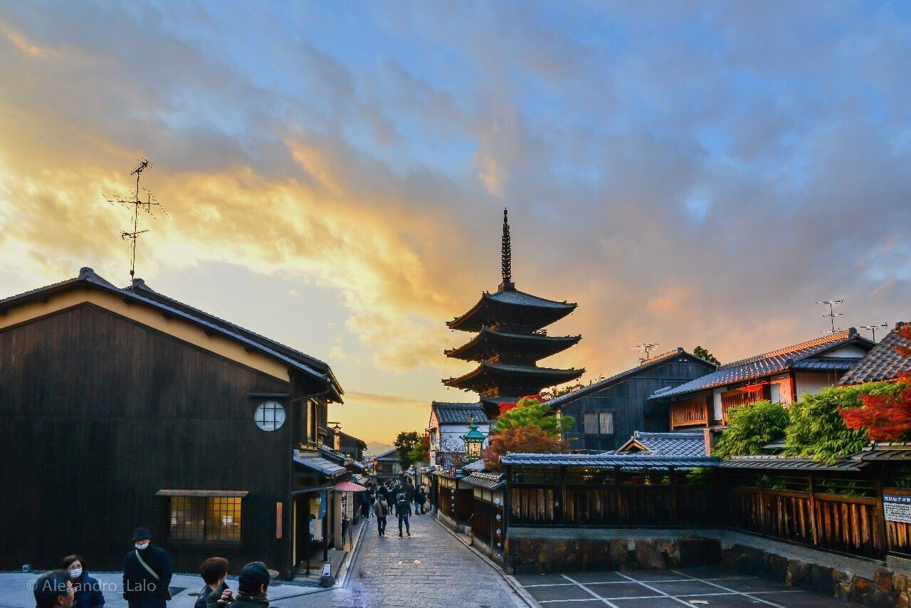 PEOPLE IN CITY AGAINST SKY DURING SUNSET