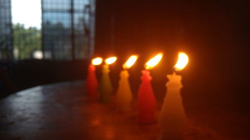 Close-up of burning candles