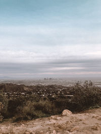 Scenic view of land against sky