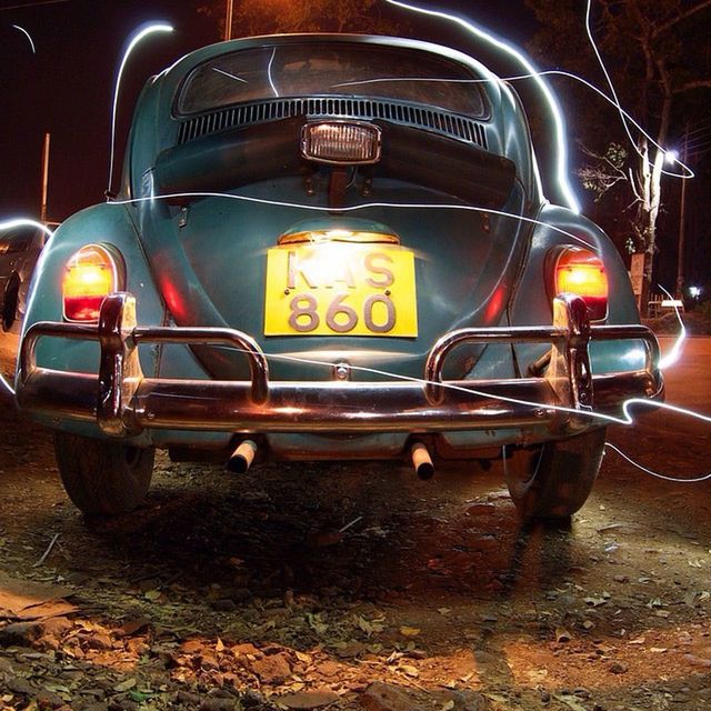 transportation, mode of transport, land vehicle, night, illuminated, car, stationary, headlight, street, parking, old-fashioned, wheel, parked, no people, outdoors, metal, travel, abandoned, vintage car, lighting equipment