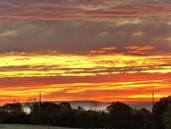 Scenic view of dramatic sky during sunset