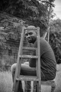 Portrait of monkey sitting outdoors