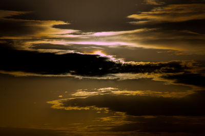 Low angle view of clouds in sky during sunset