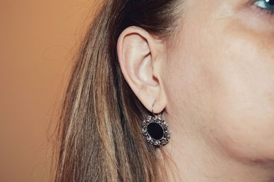 Close-up woman wearing earring