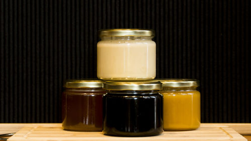 Close-up of glass of jar on table