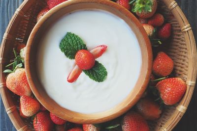 High angle view of strawberries in bowl on table